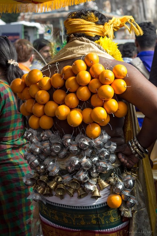 oranges and miniature milk pots to weigh down the hooks